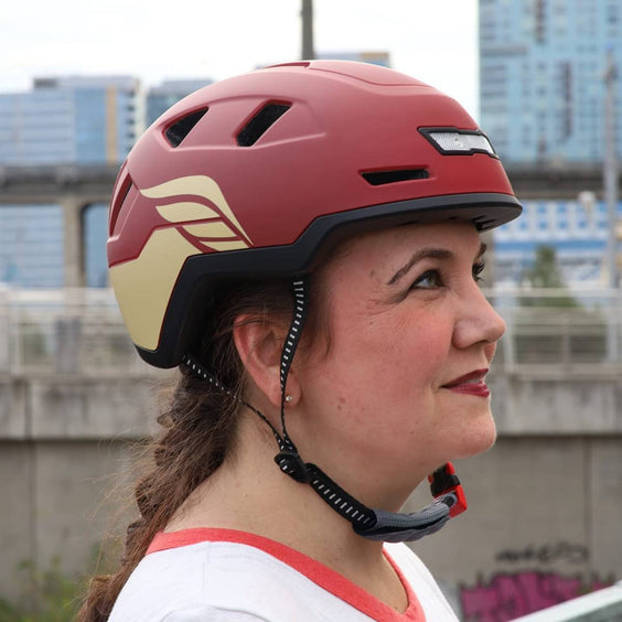 Person wearing Valkyrie helmet in urban setting