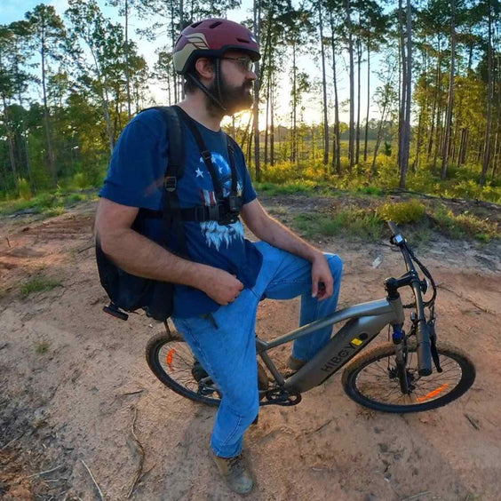 Cyclist wearing Valkyrie helmet on e-bike